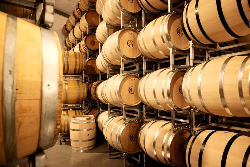 French oak wine barrels in the Patricia Green Cellars cellar