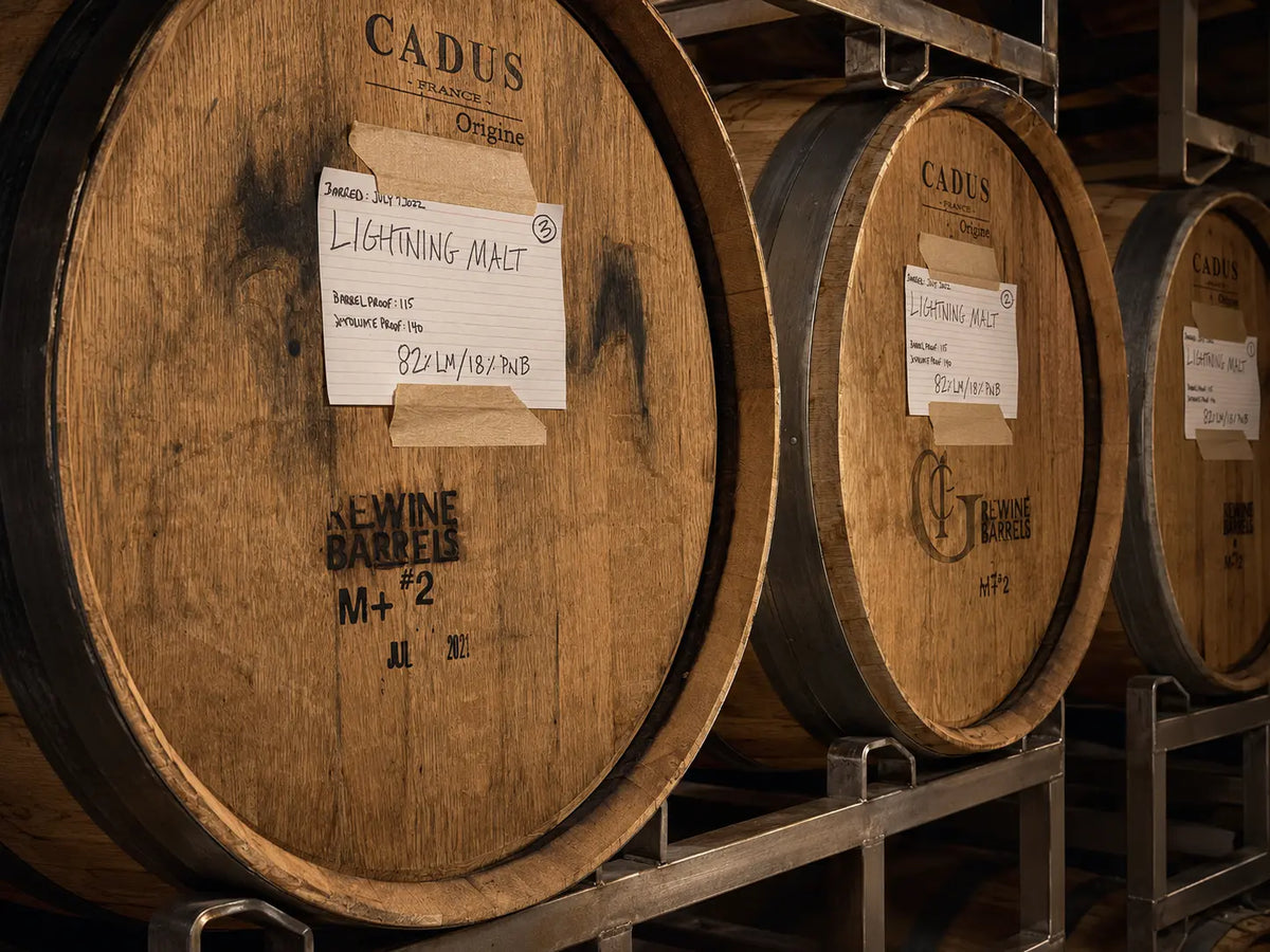 Oak barrels marked Lightning Malt at Patricia Green Cellars