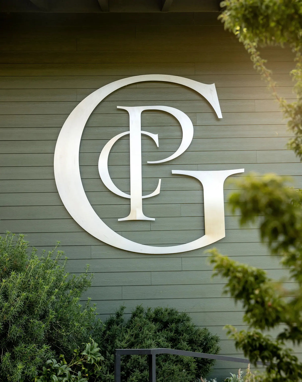Patricia Green Cellars monogram on the winery exterior
